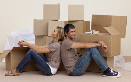 Packed moving boxes and furniture prepared for transport by Streatham removal experts