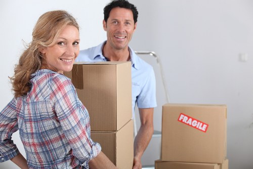 Packed moving boxes and furniture prepared for removal services in Streatham